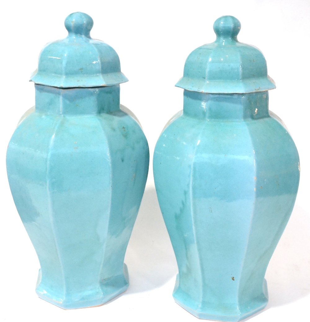 A Pair of Chinese Turquoise Glazed Stoneware Vases and Covers, modern, of hexagonal baluster form,