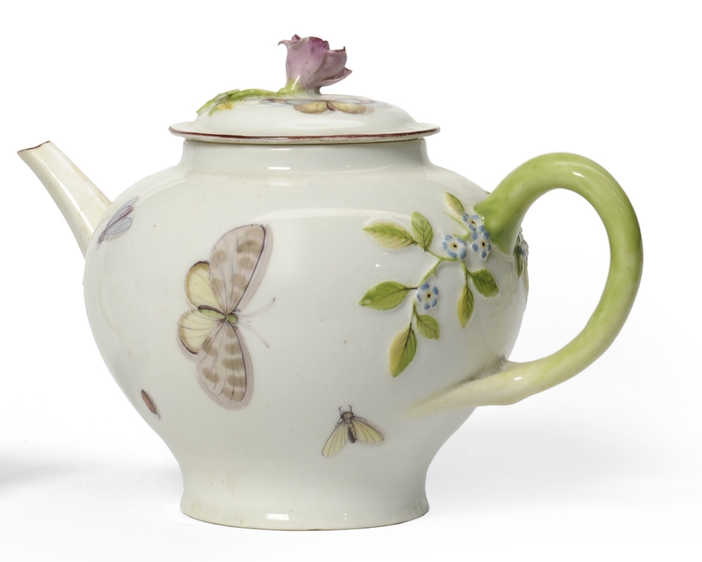 A Chelsea Porcelain Teapot and Cover, circa 1755, of baluster form painted with insects, within a