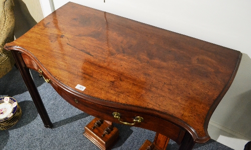 A George III Mahogany Side Table, of serpentine form, the moulded top with eared corners above a - Image 2 of 7