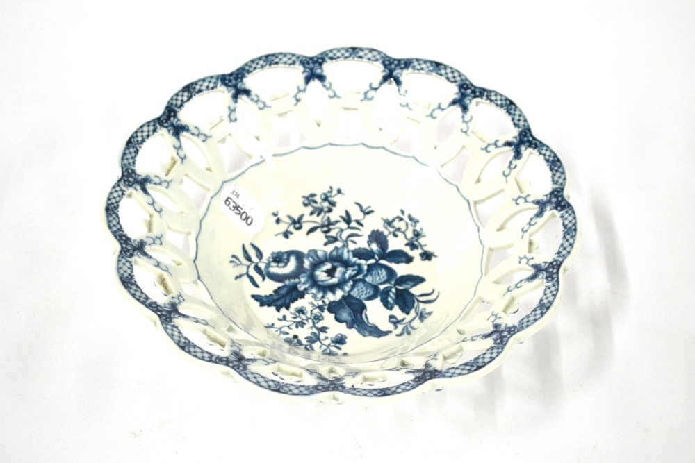 A First Period Worcester Porcelain Circular Basket, circa 1775, printed in underglaze blue with