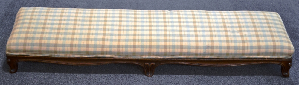 A Late Victorian Walnut Framed Double Prayer Stool, recovered in check cotton fabric, raised on