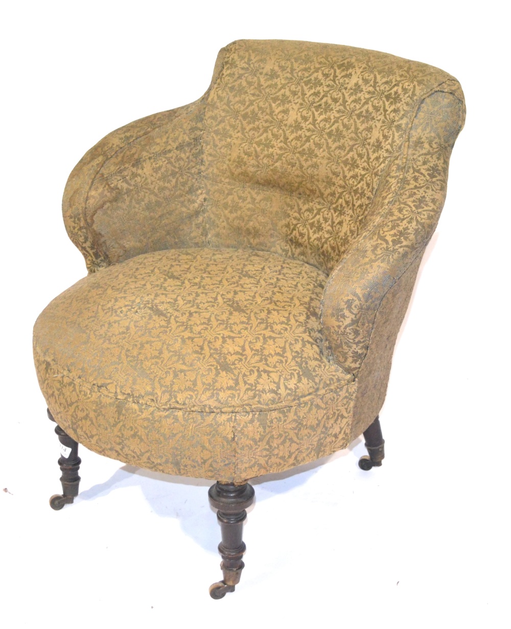 A Victorian Tub Shaped Armchair, circa 1870, recovered in blue and gold fabric with overstuffed