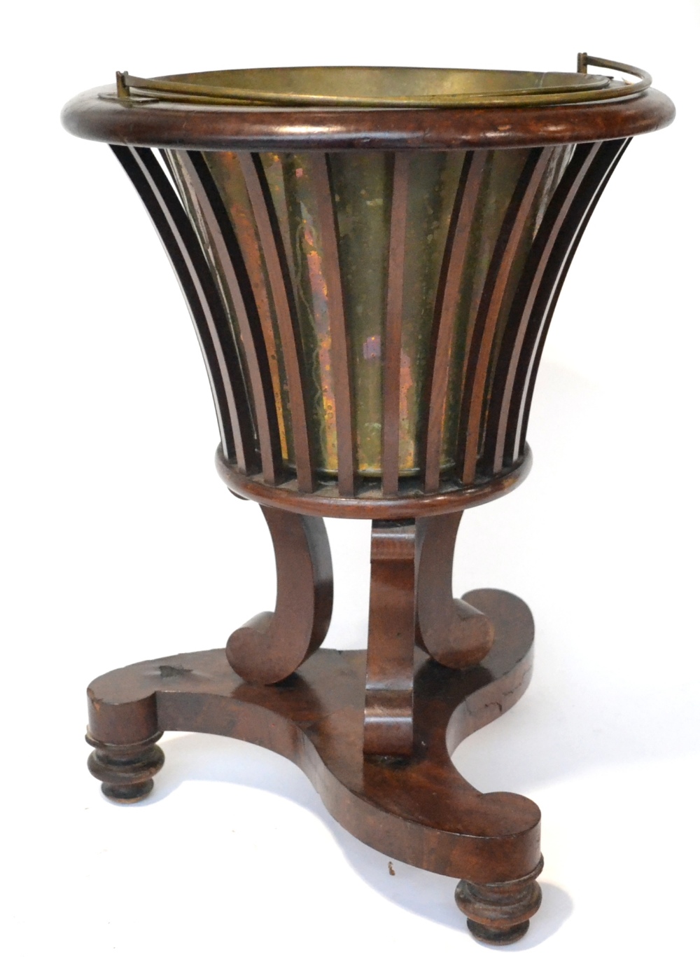 A Victorian Mahogany Jardinière Stand, mid 19th century, of cylindrical form, the pierced body