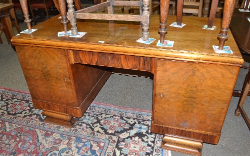 An early 20th century Continental walnut desk