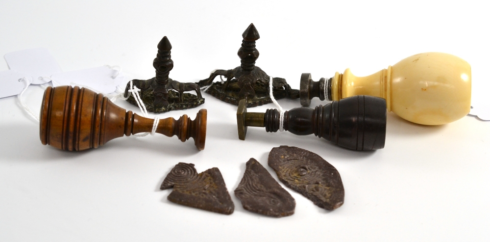 Two 18th/19th century bronze seals, Persian(?) and three other seals, one with ivory pommel