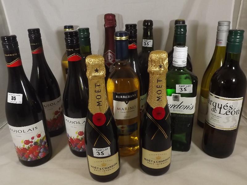 Sixteen bottles of wines and spirits to include Moet and Chandon, Gordons gin, Beaujolais, Port