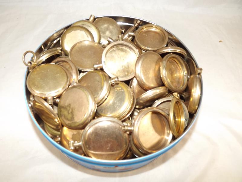 A large quantity of empty gold plated pocket watch cases - Est £30 - £40