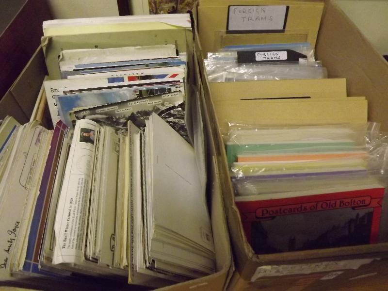 Two boxes containing a large quantity of early 20th century and later postcards relating to UK and