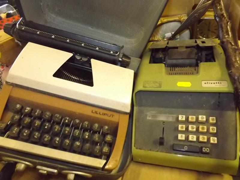 A Lilliput typewriter, cased, a Olivetti receipt machine, 2 carriage clocks, ceramic collectors