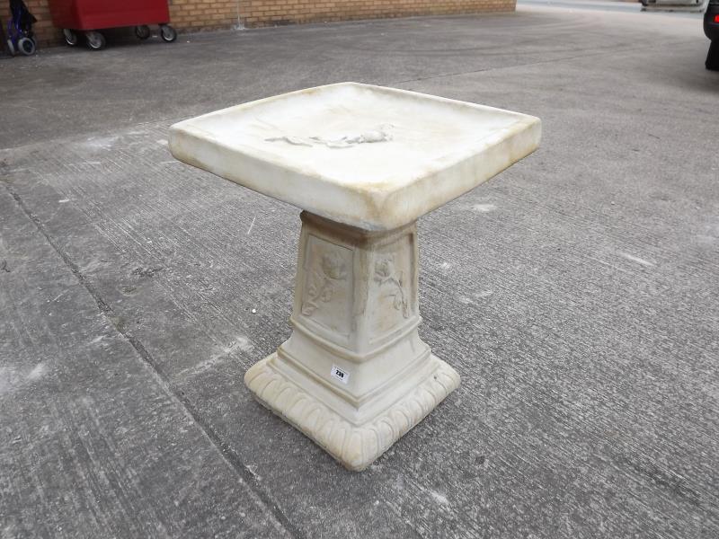 Stonework - A reconstituted stone bird bath, approx 50cm x 40cm x 40cm