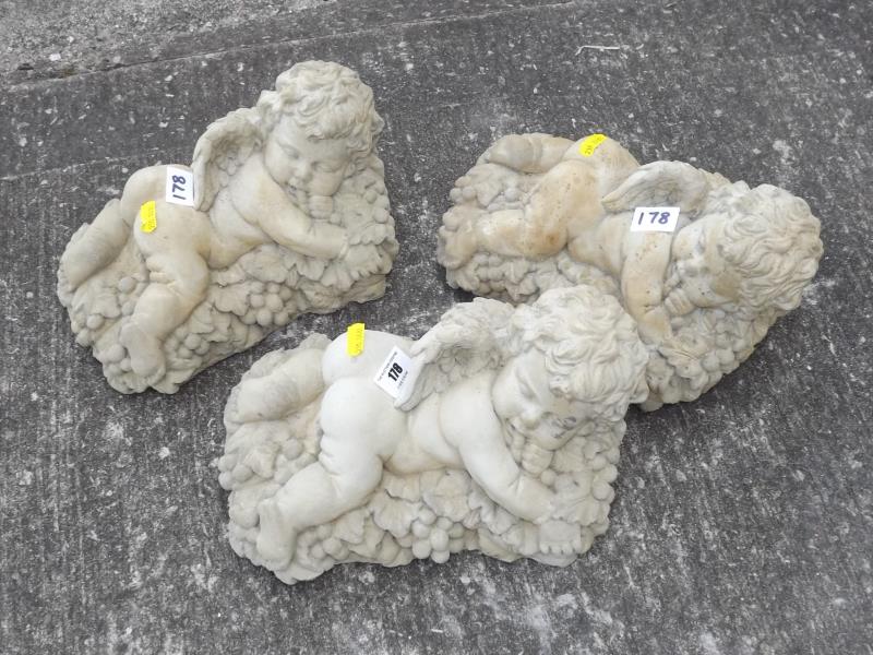 Stonework - Three reconstituted stone sculptures depicting cherubs (3) - Est. £20 - £40