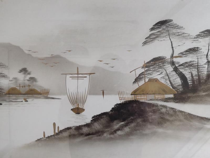 A Japanese watercolour with gilt highlights depicting a lake land scene, two panel character
