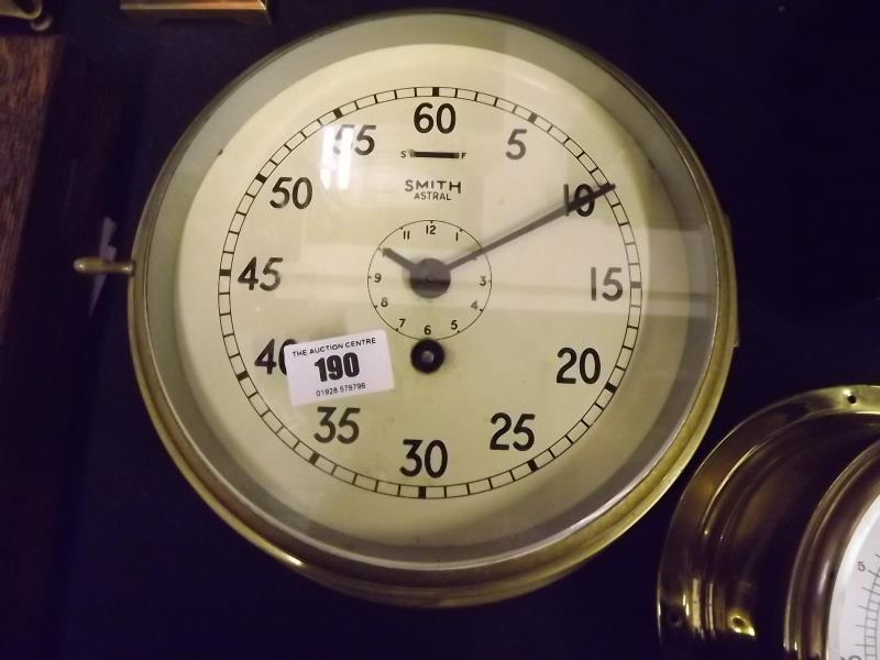 An unusual ship's clock in a brass drum case, movement by Smiths Astral, dial having a type of