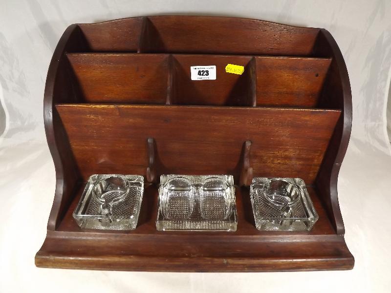 A mahogany desktop set with glass ink wells 22cm (h) x 38cm (w) x 25cm (d)