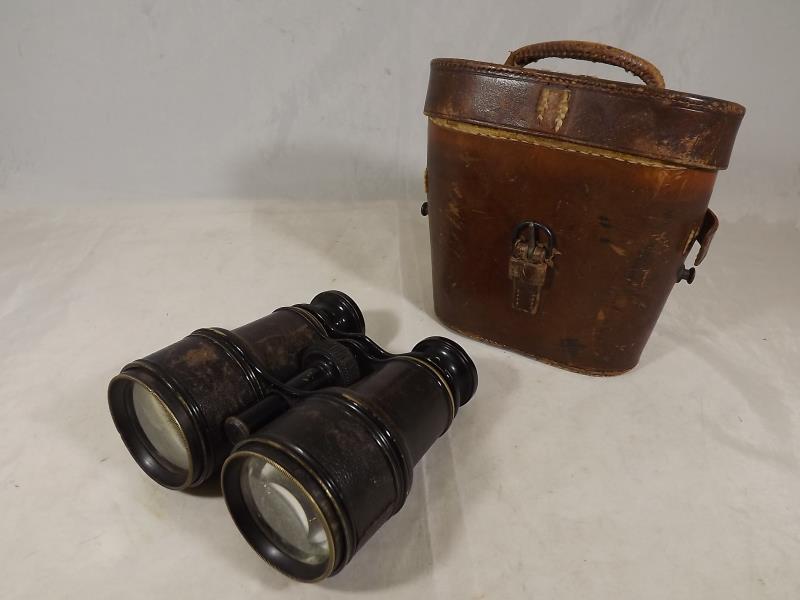 A pair of binoculars by Negretti & Zambra in original leather case