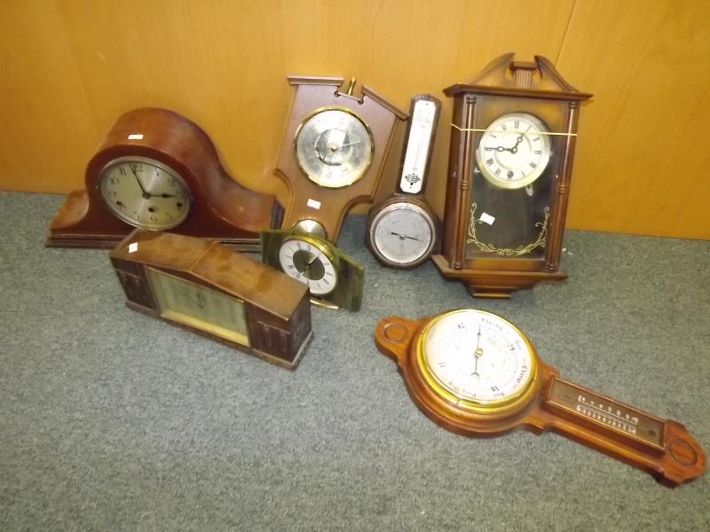 A quantity of wall clocks, mantel clocks, barometers and similar