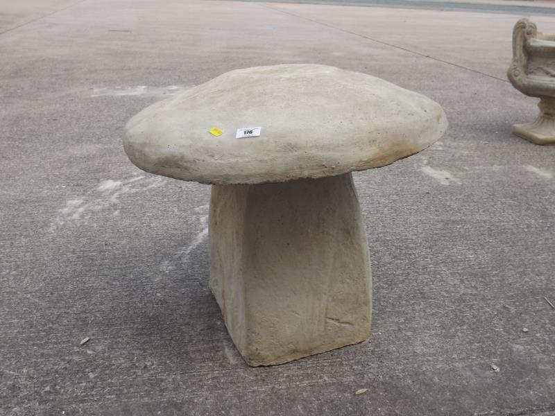 Stonework - A reconstituted stone sculpture in the form of a mushroom, 52cm (h) x 56cm (dia)