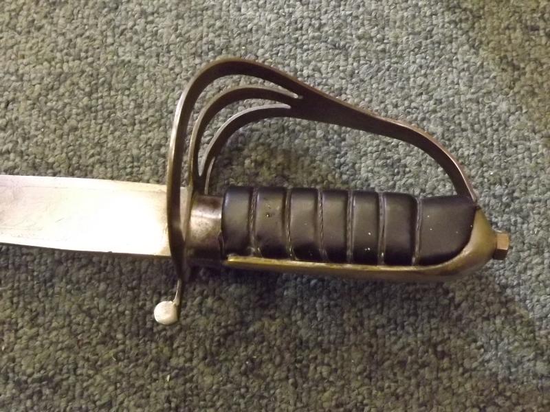 An 18th century army / light cavalry saber with leather grip and full basket guard, the blade - Image 5 of 6