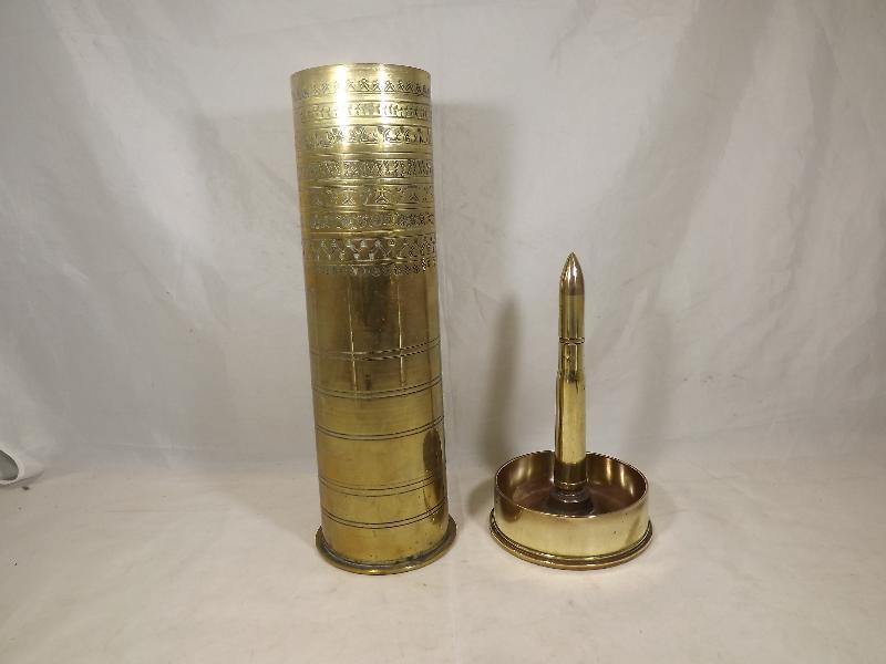Two pieces of brass trench art comprising a shell and table lighter (2)