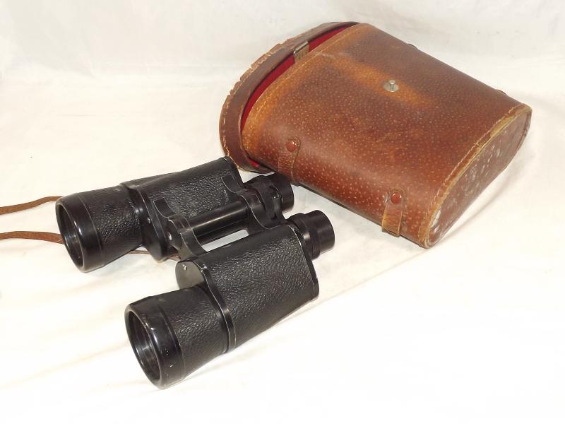A pair of Zenith coated lens field binoculars 7 x 50 serial number 3367, leather cased