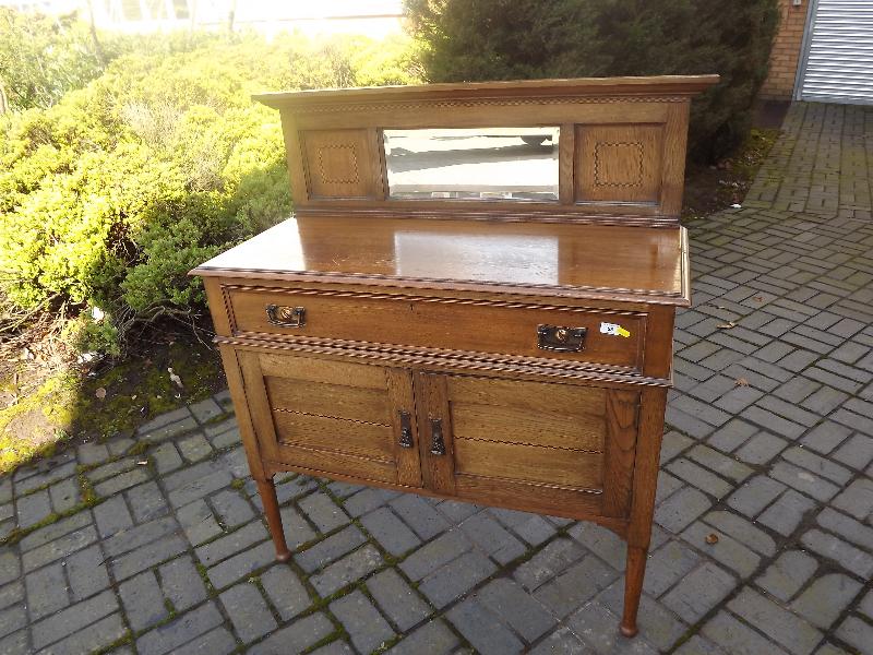 A good quality early 20th century mirror backed washstand with later modification, chequered