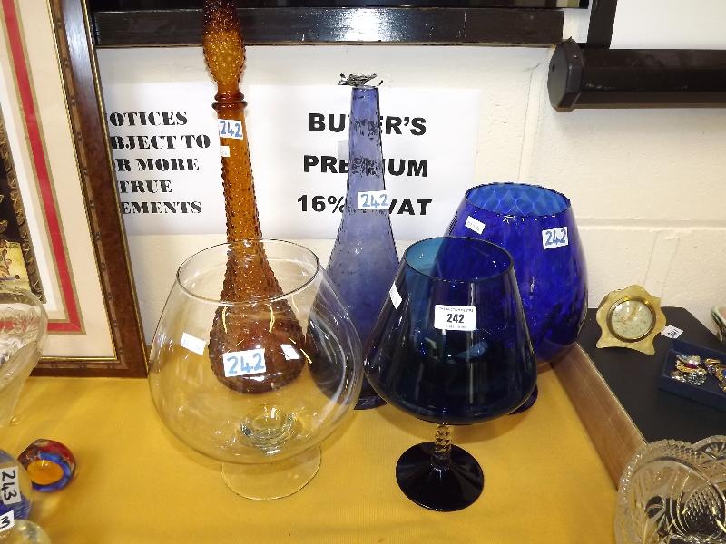 A collection of five pieces of decorative glassware to include large bubble decanter, large brandy