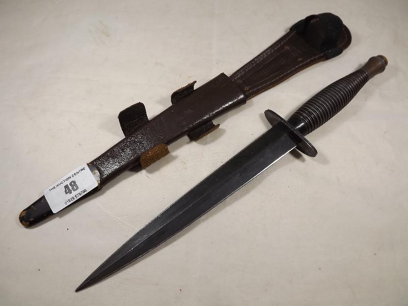 A World War Two (WW2) British Commando SAS Fairbairn-Sykes fighting knife, marked Sheffield, England