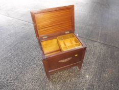 A mahogany sewing box with hinge top lid