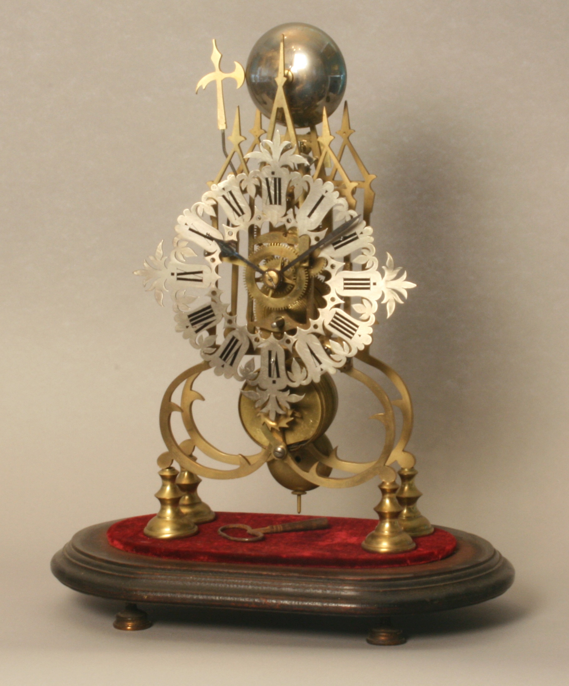 A Good Victorian Gilt Brass Skeleton Clock. With passing strike movement striking on a bell.