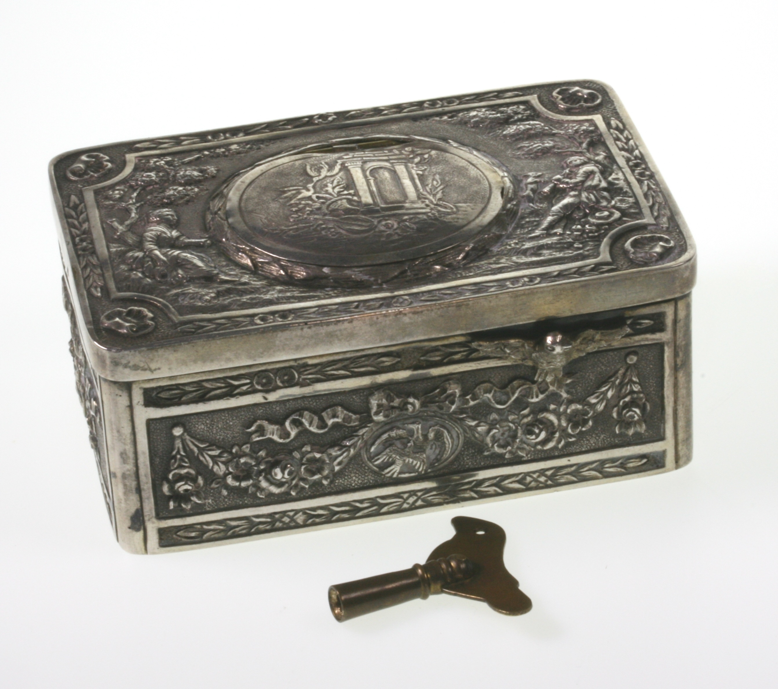 A Fine Continental Silver Bird Box. 19th century. Stamped 800 and with other continental