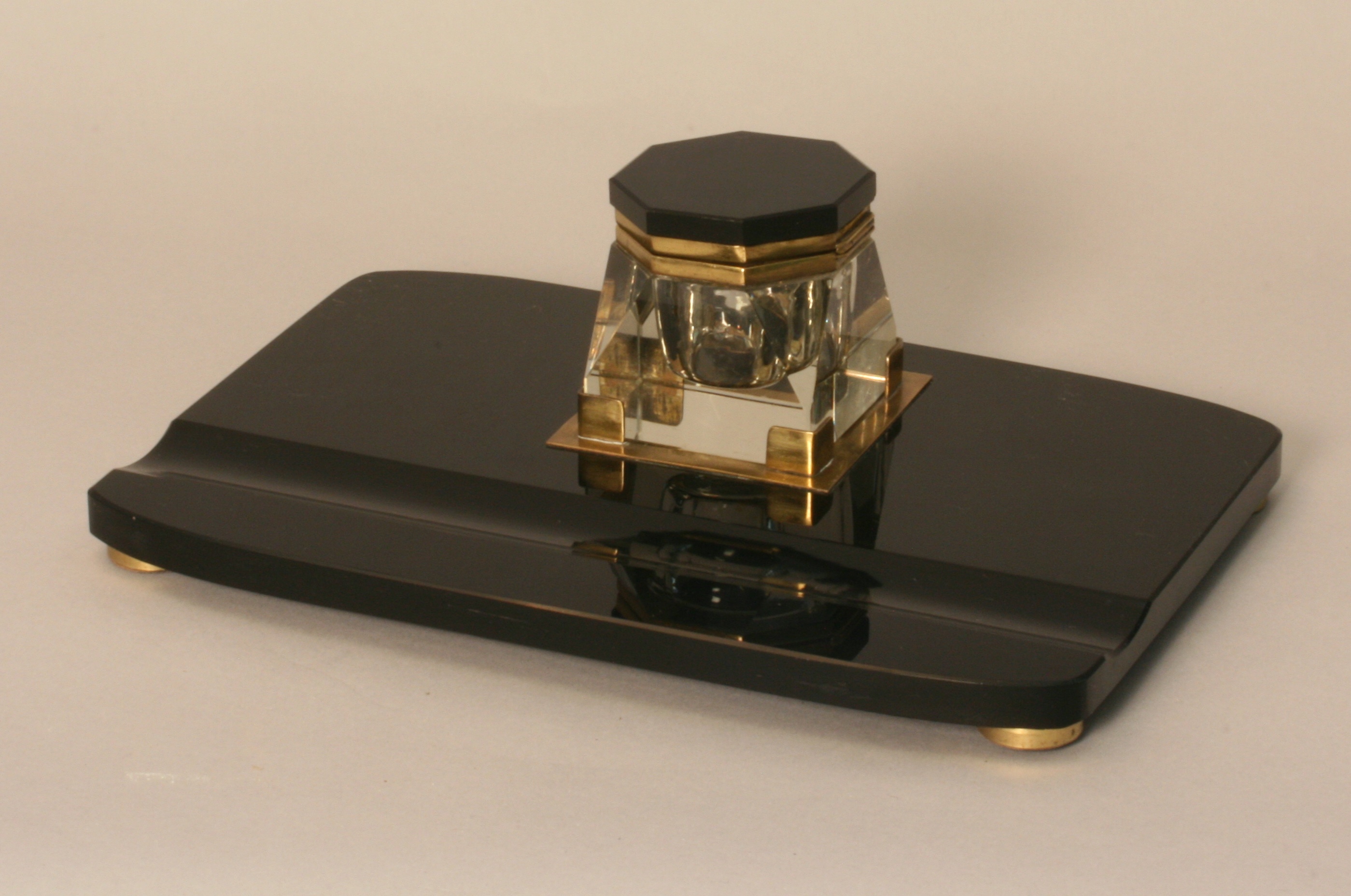 An Art Deco Black Marble and Brass Inkstand. Circa 1920. Complete with large central  cutglass