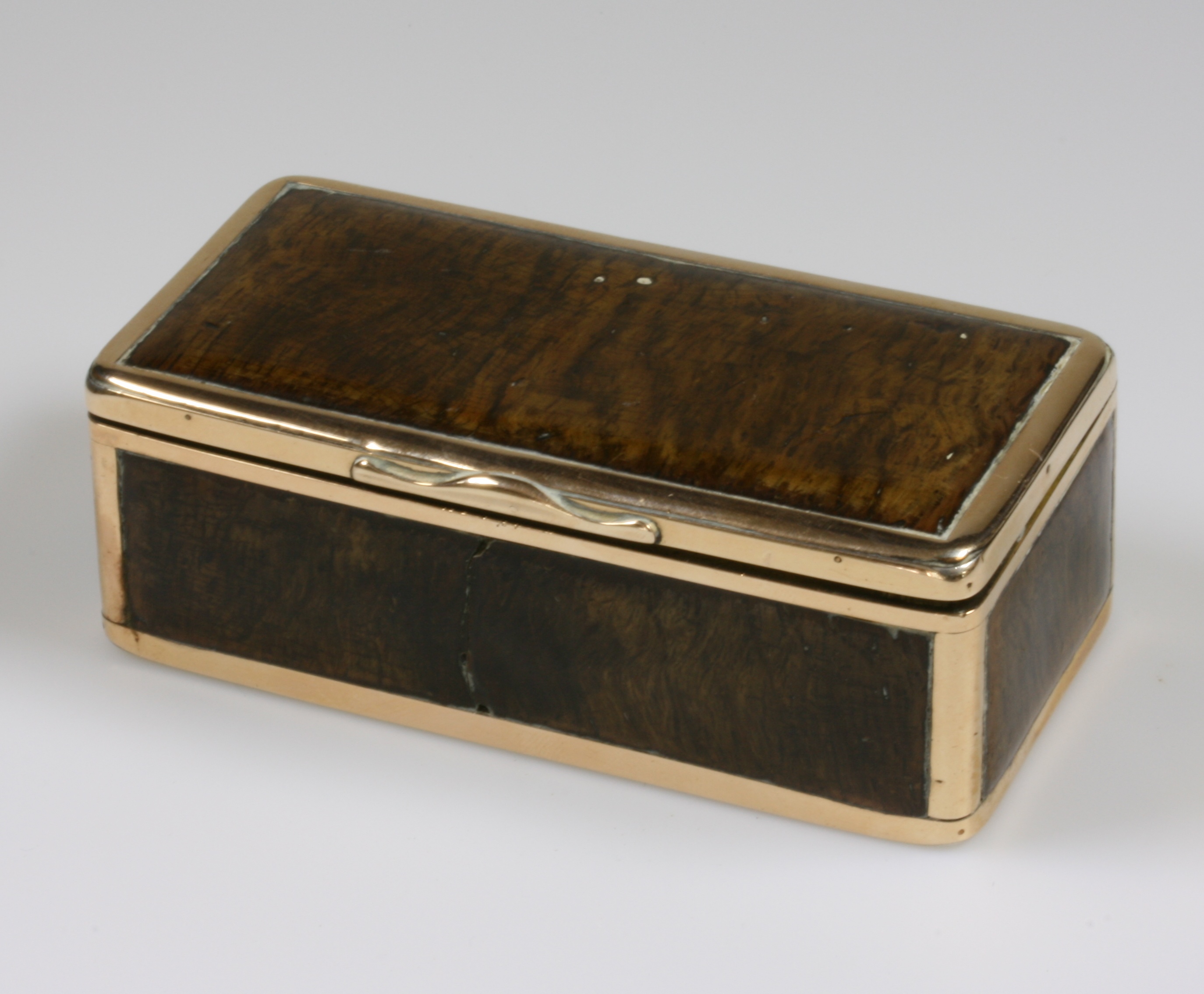 A Silver Gilt, High Carat Yellow Metal and Walnut Table Snuff Box. 19th century. Of plain