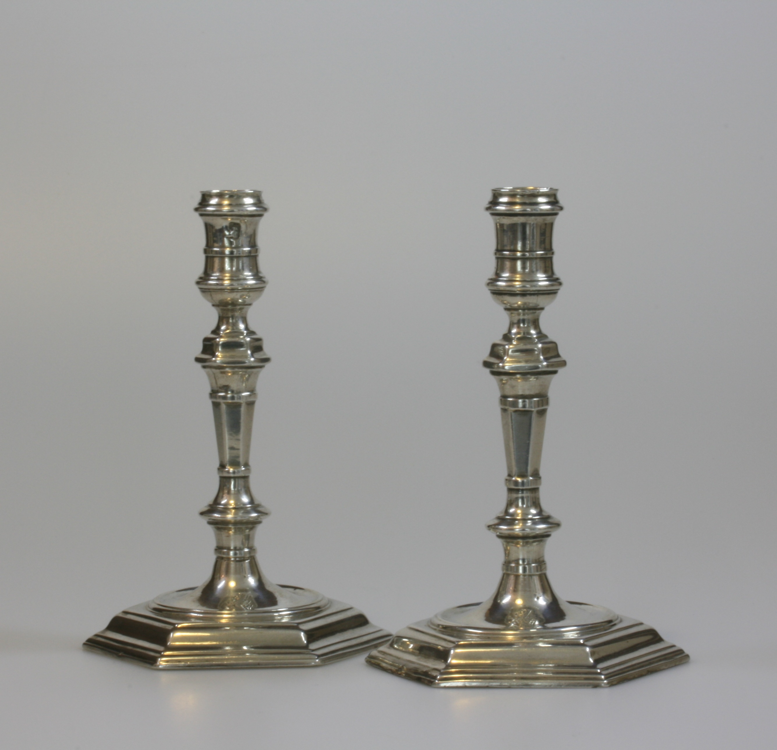 A Pair of George II Silver Taper Sticks. Humphrey Payne, London, 1733. Each on a Hexagonal stepped