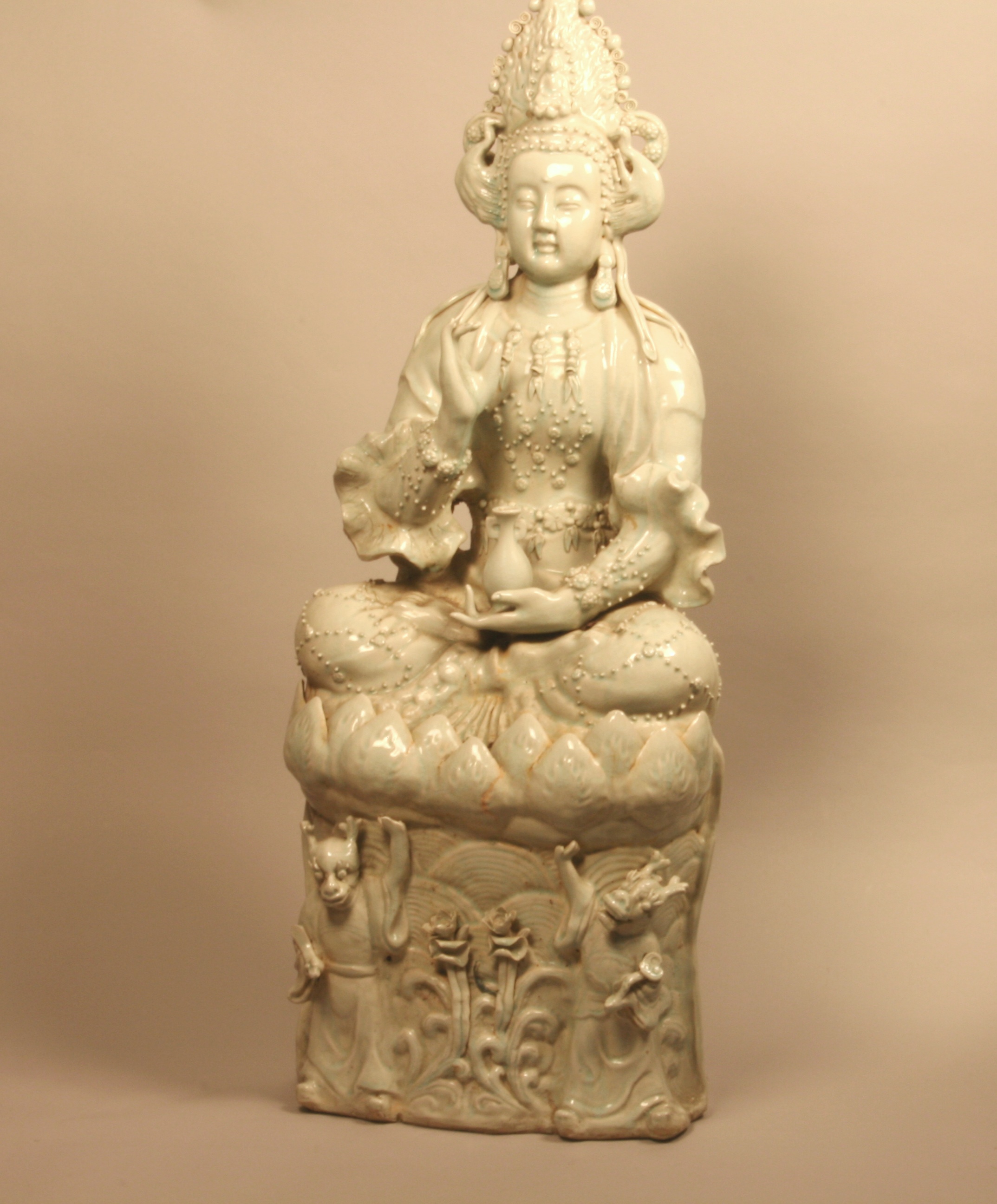 A Large Chinese Pale Celadon Porcelain Statue of Guanyin. Late19th/early 20th century. Shown