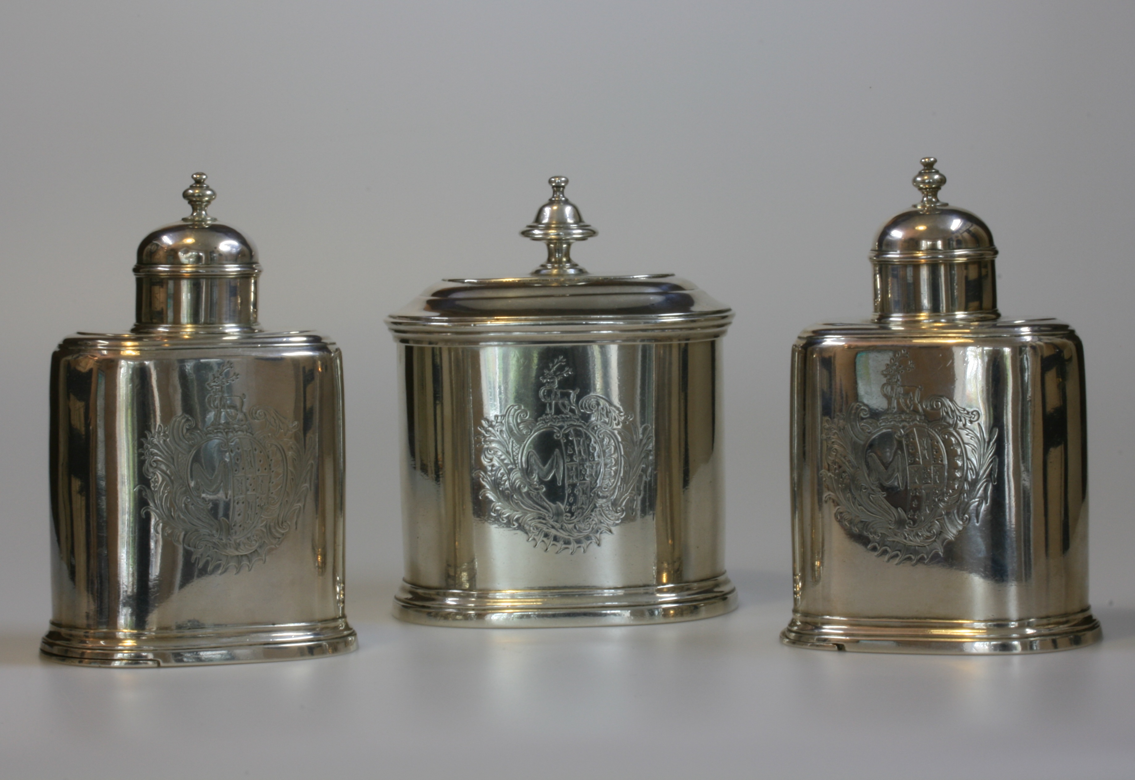 A Set of Three George II Silver Tea Canisters. Makers mark IN ( in script) for John Newton . See