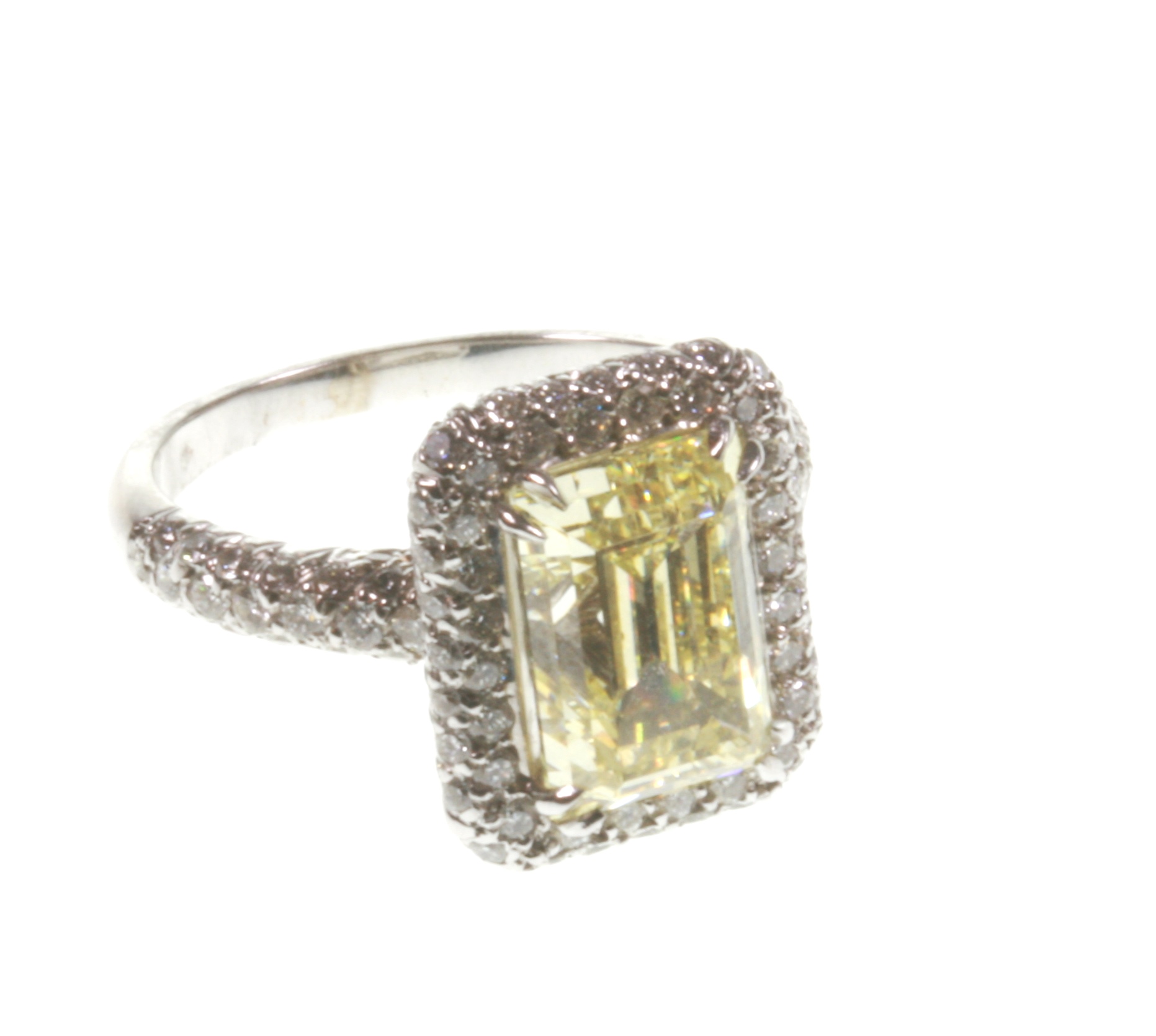 A Natural Fancy Yellow Diamond Dress Ring. 3.75 carats VS2. Size M. With GIA of America certificate.