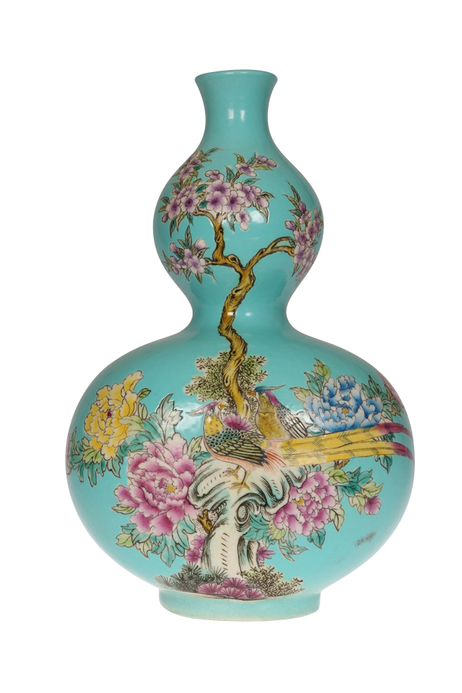 A Chinese double gourd vase, painted in polychrome enamels with two birds upon a peony bough,