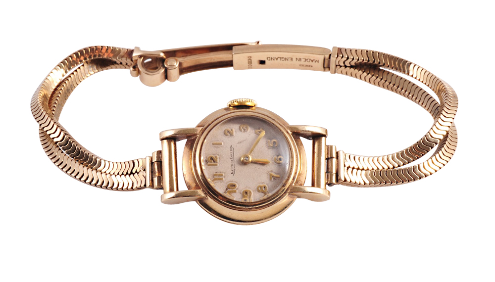 A vintage Jaeger-Le Coultre lady's 9 carat gold wristwatch, the circular dial with Arabic