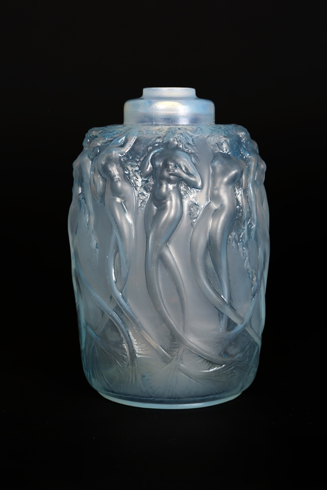 Lalique, a Sirens pattern opalescent glass perfume burner, the shouldered ovoid body moulded with