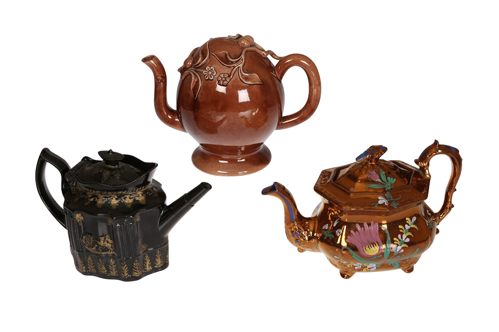 A Cadogan pottery brown-glazed teapot, probably by Brameld, moulded in Chinese style with boughs