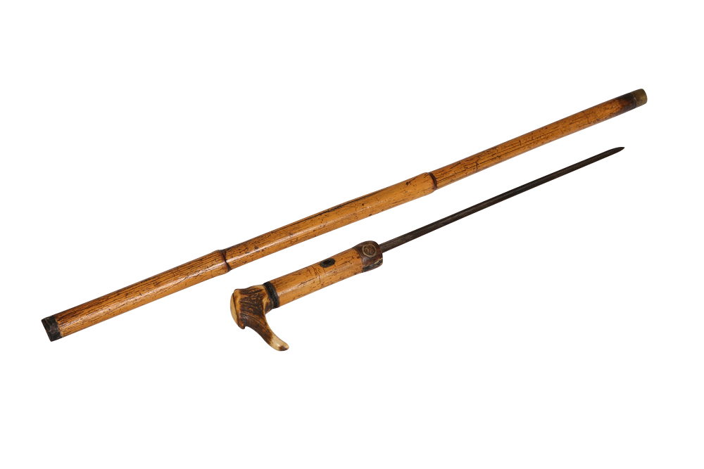 A bamboo swordstick, early 20th Century, with 13" blade and antler handle. 83cm