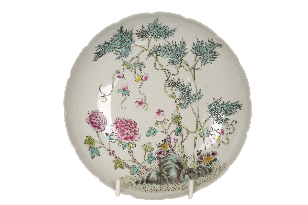 A small Chinese porcelain dish, circular with crenellated rim, principally enamel painted with - Image 2 of 2