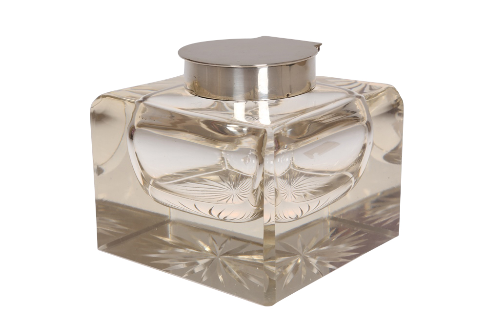 A large George V silver-mounted inkwell, London 1913, the substantial glass cube with star-cut