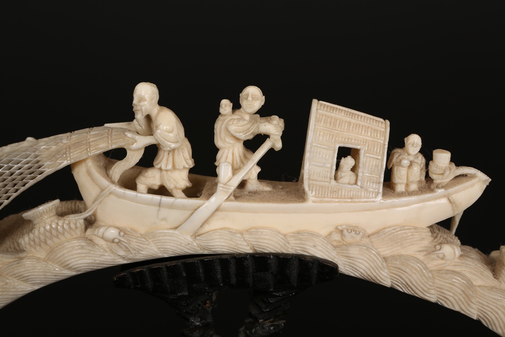 A Chinese carved ivory tusk, late 19th/early 20th Century, carved with fishermen and children on a - Image 2 of 2