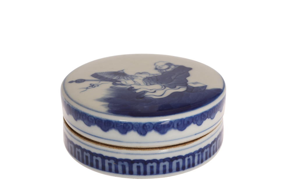 A Chinese blue and white porcelain paste pot, the circular cover painted with an immortal, bears six