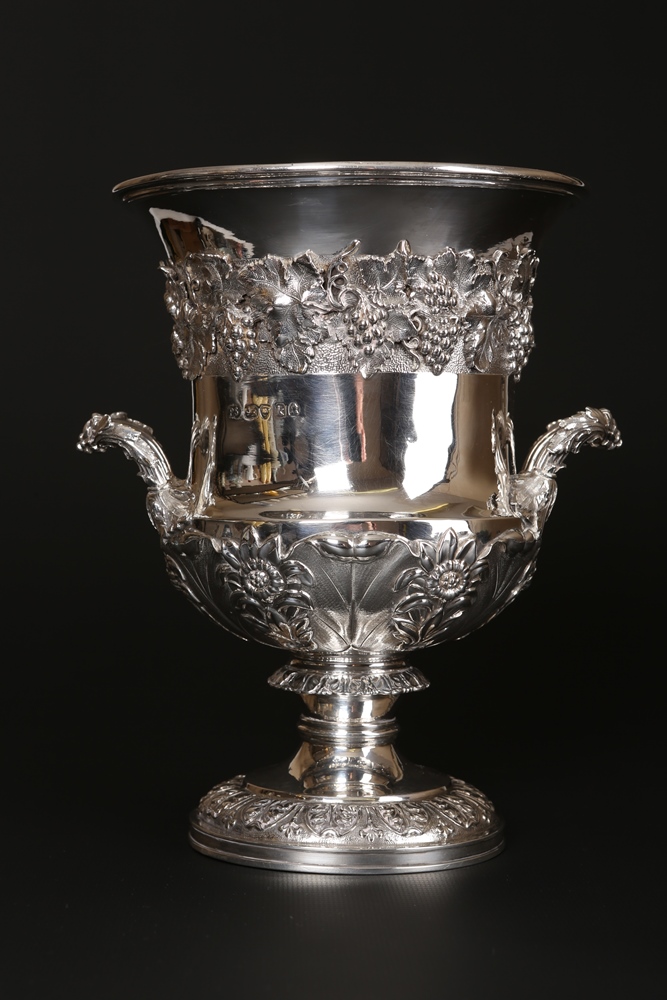A George IV silver two-handled vase, Paul Storr, London 1825, the urn with flared rim over a band of