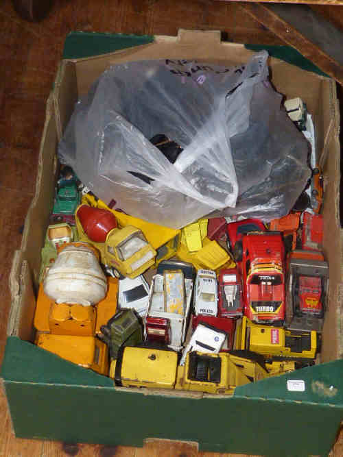 Box of model vehicles and cameras