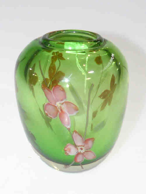 A cased glass vase with floral inclusions