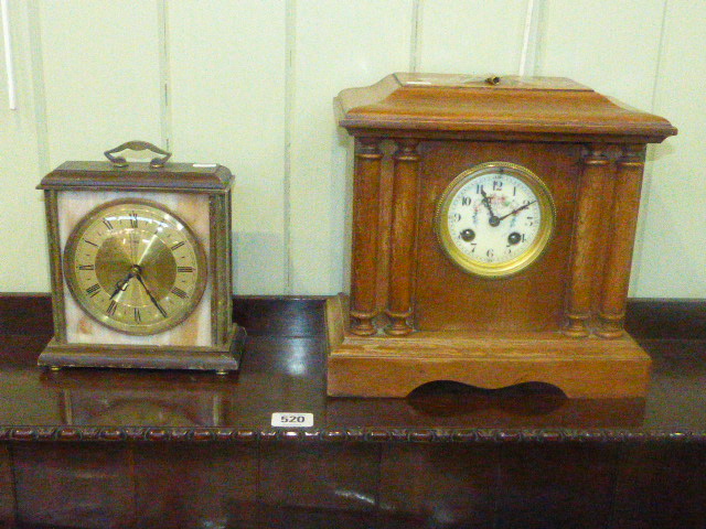 Oak mantel clock together with another clock