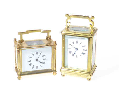 Brass cased carriage clock with bevelled glass; and another carriage clock (2)